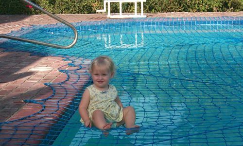 Little Girl on Safety Pool Net