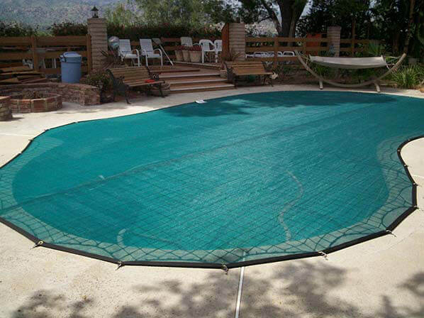 Pool safety cover installed