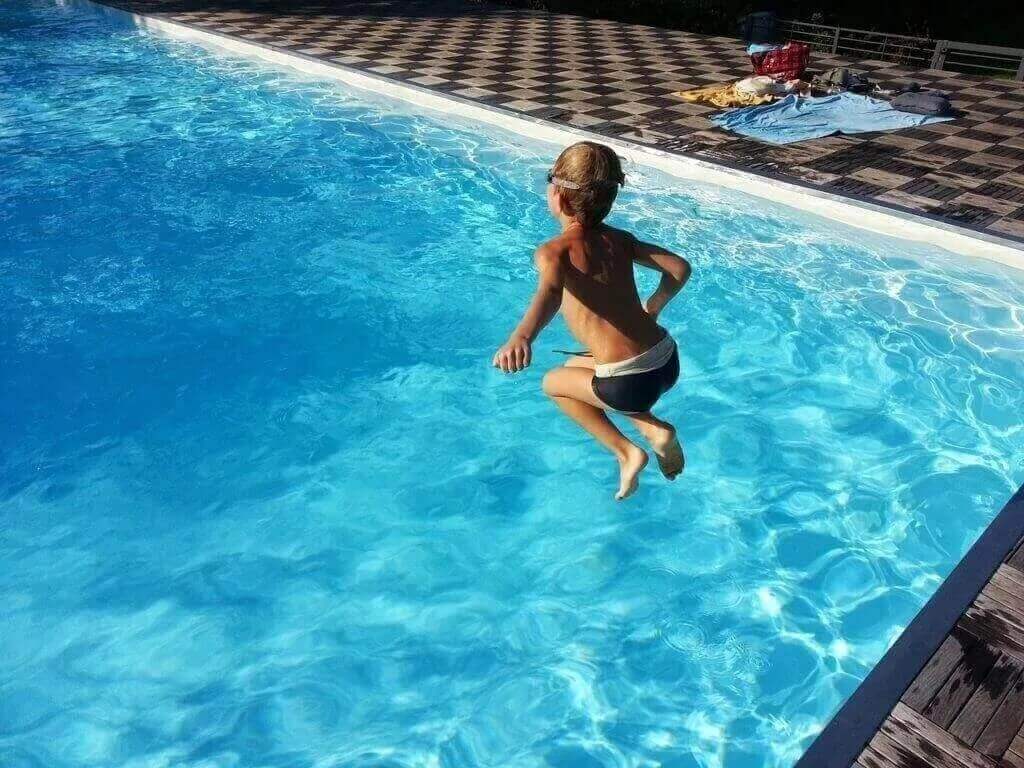 child-pool-jump