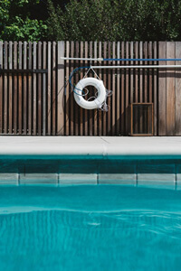 Pool door with an alarm