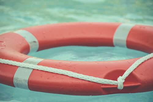 red and white life ring buoy