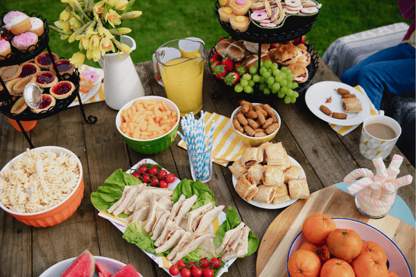 a variety of snacks and foods for a pool party
