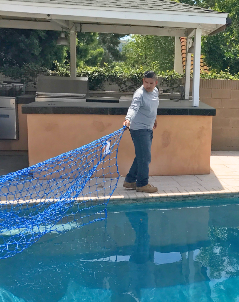 Walk the Net out across the pool, it will float out across the water