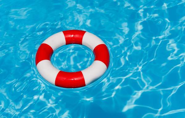swimming pool with lifebuoy floating