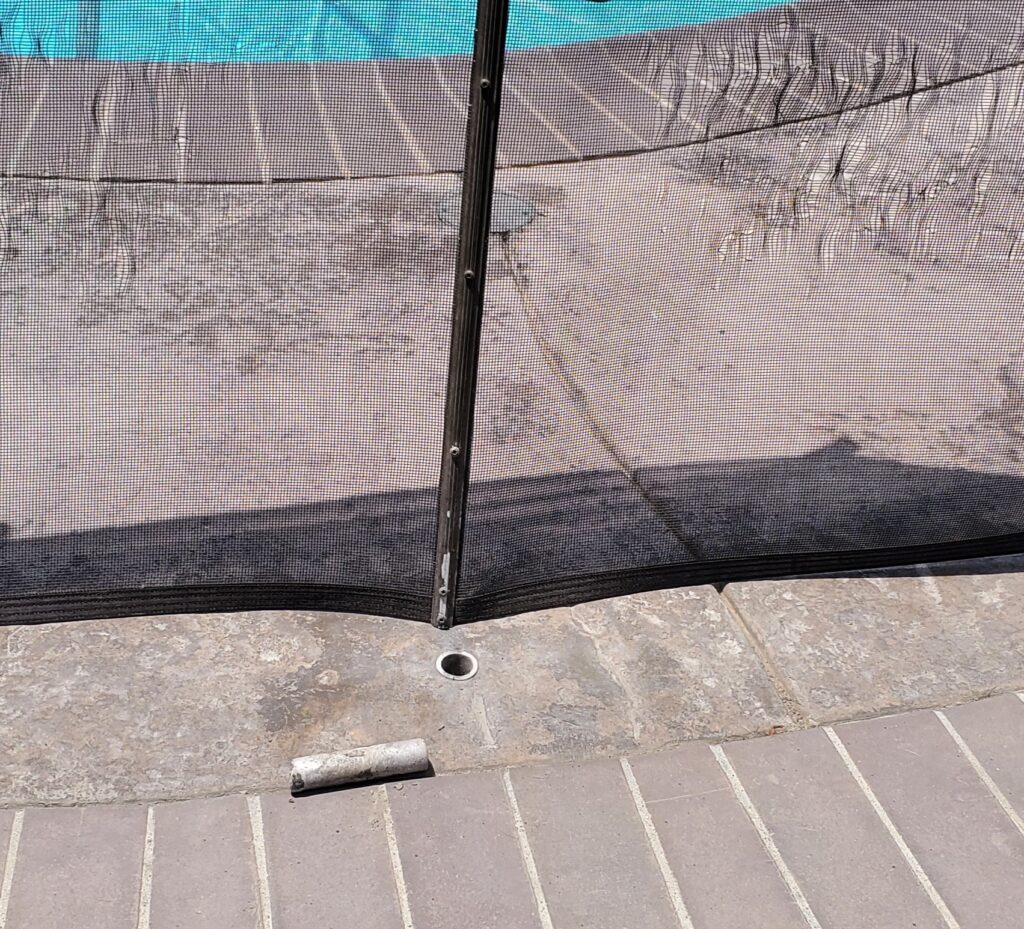 Broken pool fence pole 