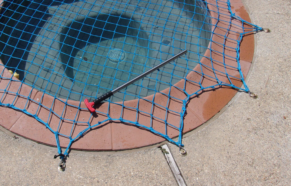 Round Loop Tool shown on Safety Net with Threaded Brass Anchors and Round Loop Clips
