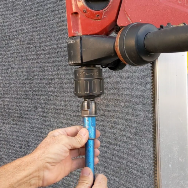 Generic Core Bit being installed into drill rig