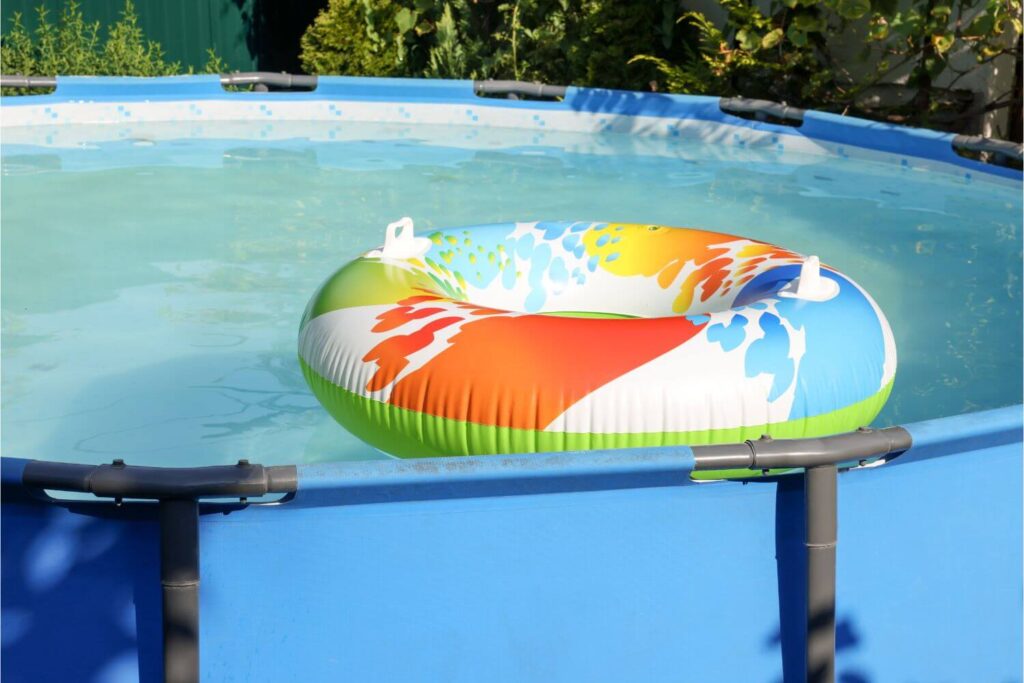 inflated pool tube floating in an above-ground pool