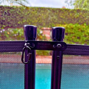 Quick Lock Latch Kit on black fence