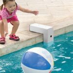 Poolguard Inground Pool Alarm (Model: PGRM-2) Installed showing child near pool
