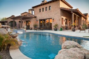 Brick home with swimming pool in the backyard