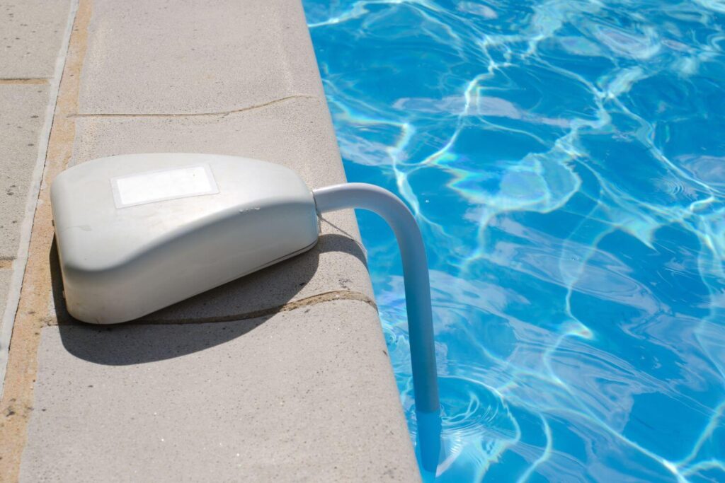 swimming pool alarm installed on the surface of a swimming pool
