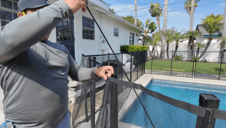 Installer puts molding on back of mesh