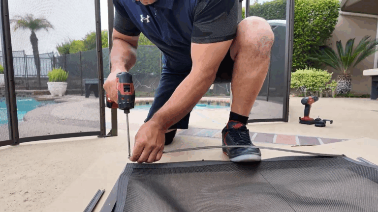 Installer attaches molding and mesh to frame using foot method