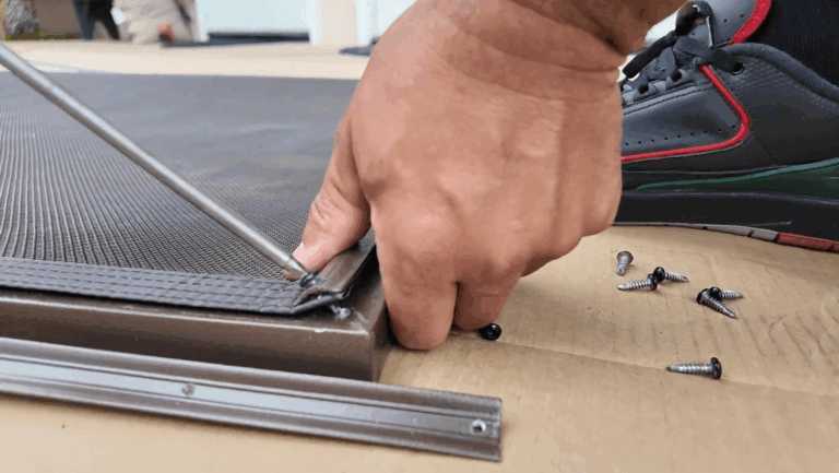 Installer inserts screws at a slight downward angle