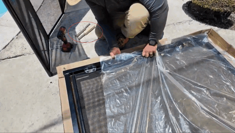 Installer sets the Peg Shifter inserts aside and pulls the plastic up about a foot