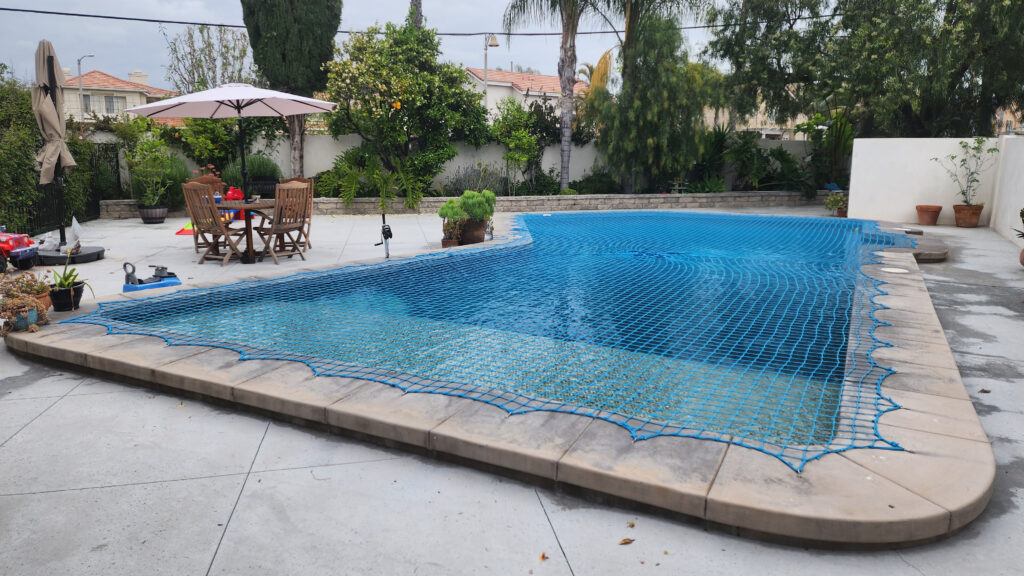 Swimming Pool Safety Net in Blue over Swimming Pool