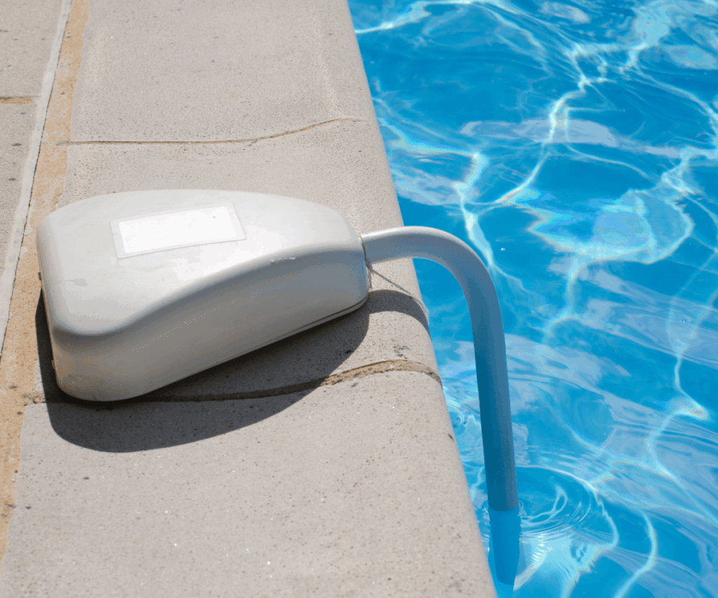 white pool alarm installed in a residential swimming pool

