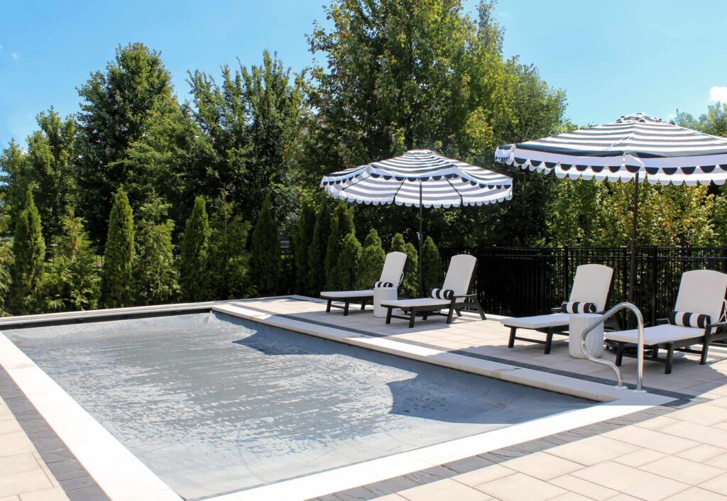 Solid pool cover providing full surface protection