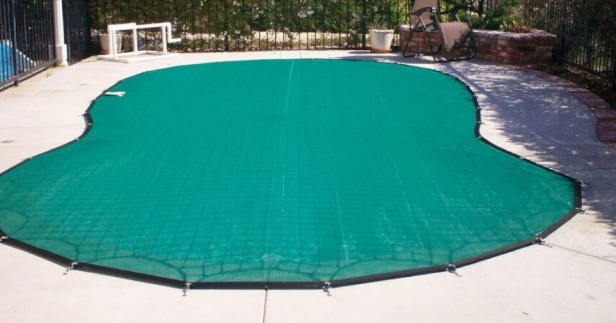Installed pool leaf cover on a backyard irregular shaped pool