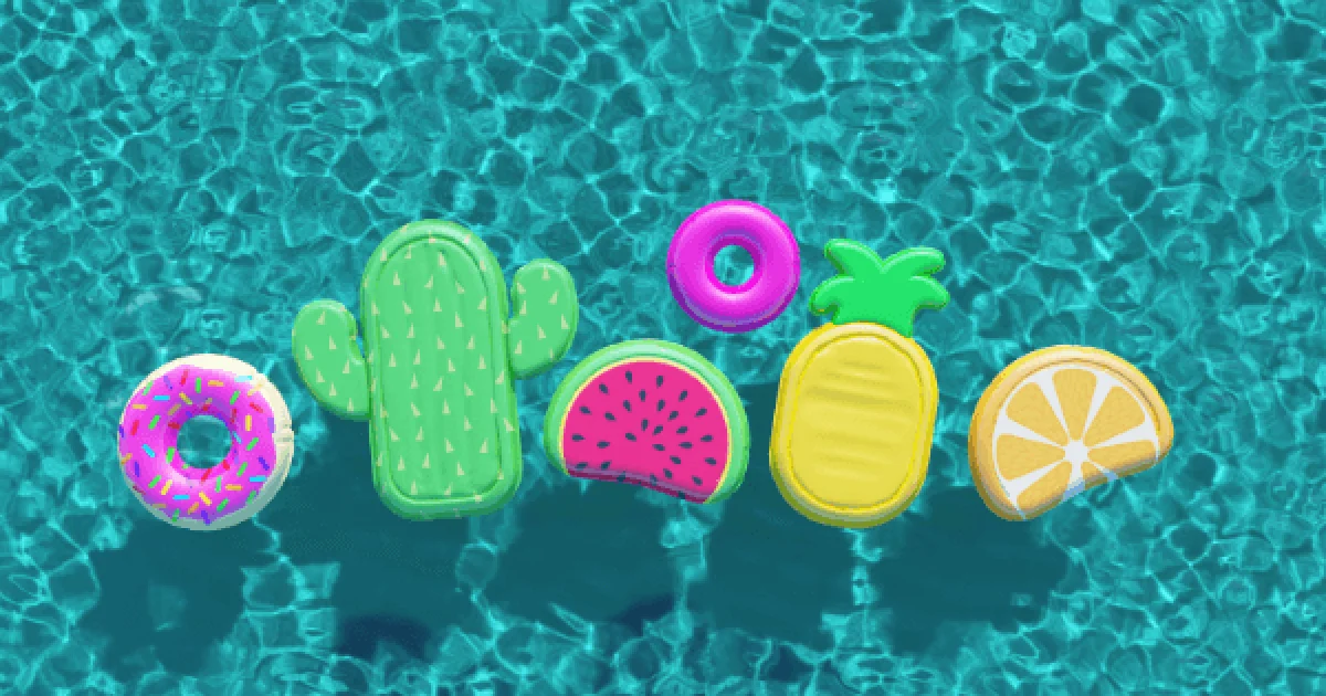 neon colored pool floats floating in a swimming pool