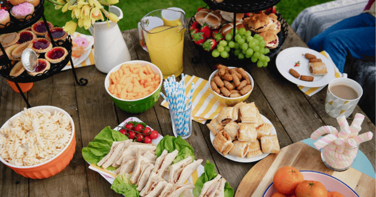 a variety of snacks and foods for a pool party